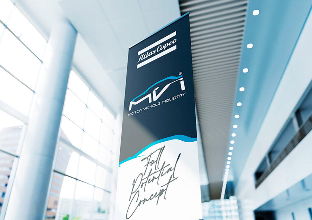 Banner Programa MVI Motor Vehicle Industry. Parte integrante do Manual de Linguagem da Marca desenvolvido pela Ópera Criativa para a Atlas Copco Brasil.